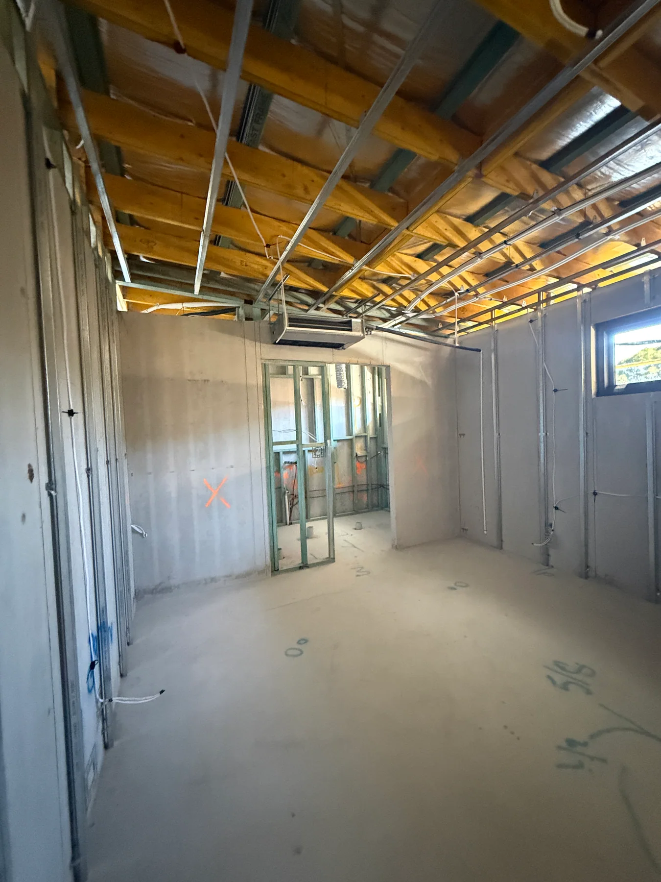 Unfinished room in a Kensington new-build during construction