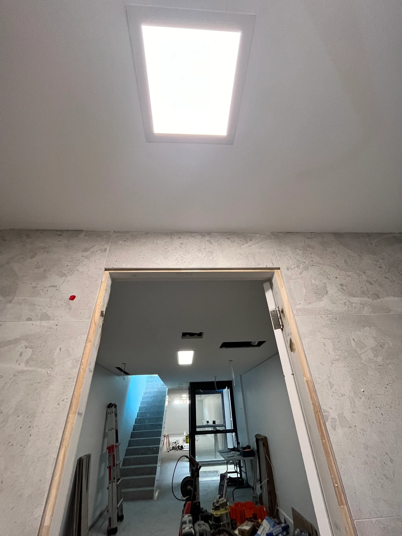 Illuminated ceiling panel over the hallway and stairs in a Randwick new-build